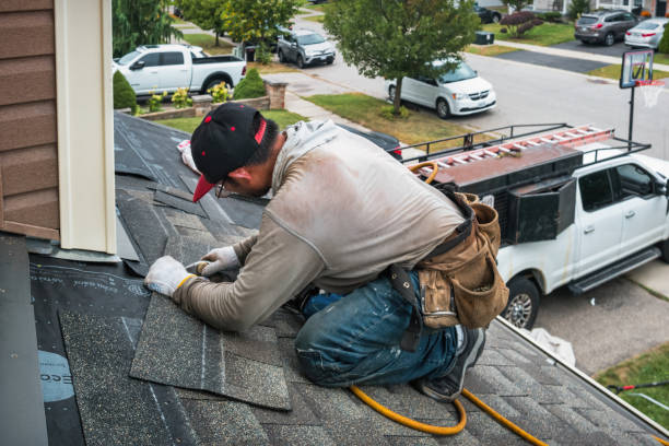 Professional Gutter Repair And Installation technician working in Marion, MS